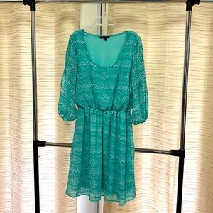 Gently used large teal chevron dress